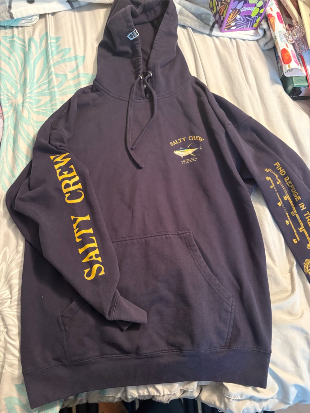 Salty Crew navy hoodie with yellow graphics